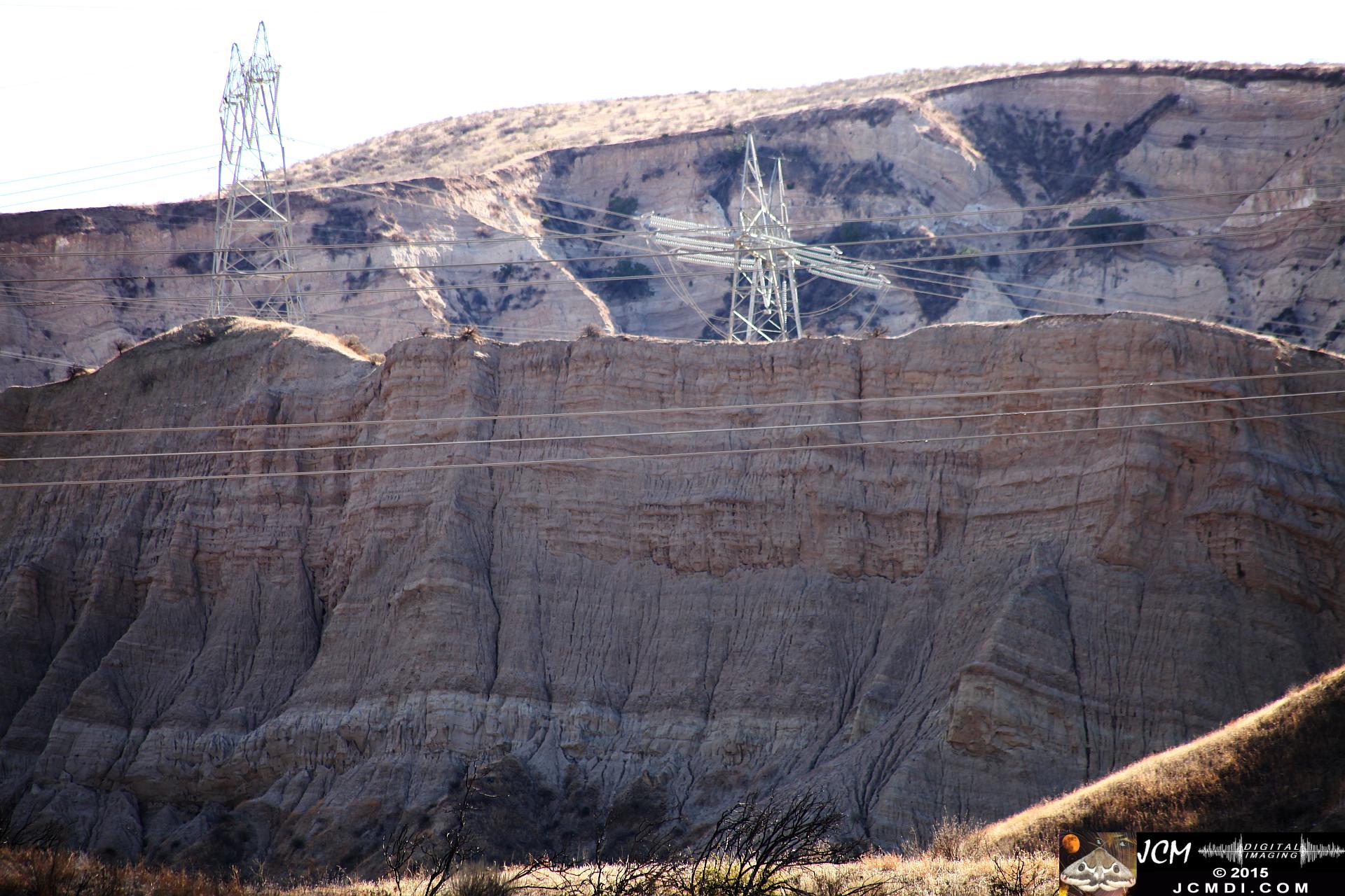 Landslide, buckled pavement, and terrain at Vasquez Canyon Road in Santa Clarita, CA filmed 11-25-2015